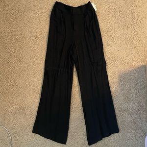 Black leopard jacquard Good American satin trousers. Size 2. NWT.